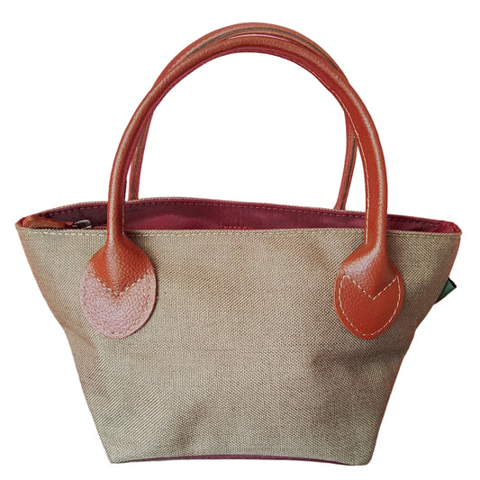 Bolso verde de loneta y asas marrones