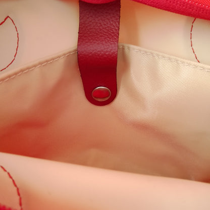 bolsillo interior de bolso crudo y rojo