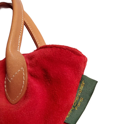 asa de piel color cameldel bolso rojo 